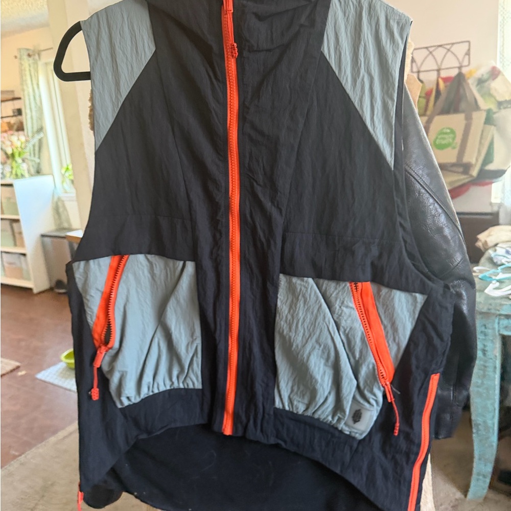 FP Movement Black and Orange Sleeveless Windbreaker Vest - Packable Utility Vest